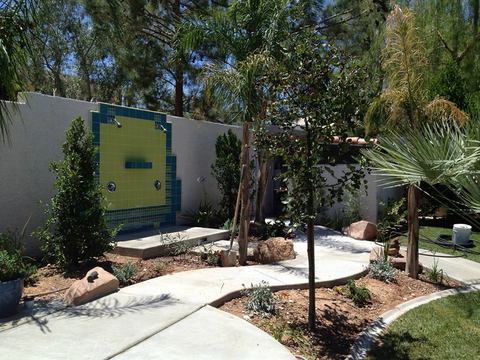 Eclectic Landscape with backyard landscaping