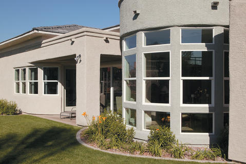 Modern Home Exterior with floor to roof windows