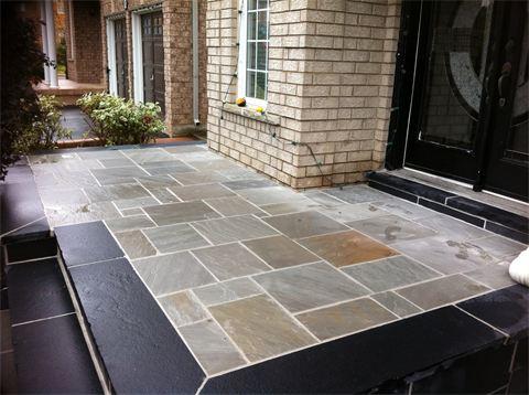 Contemporary Porch with double glass front entry door with black trim