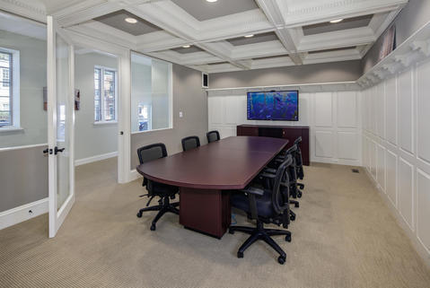 Contemporary Home Office with white painted wainscoting