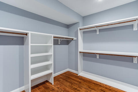 Traditional Closet with storage shelves