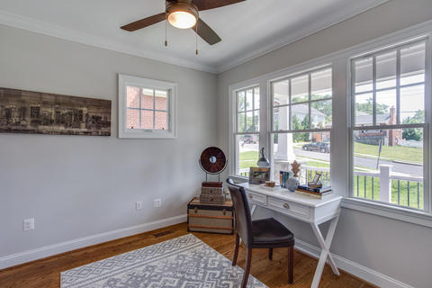 Contemporary Home Office with light blue and white area rug