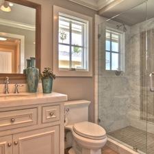 Eclectic Bathroom with frameless glass shower doors