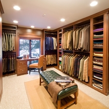 Traditional Closet with wood raised panel cabinets
