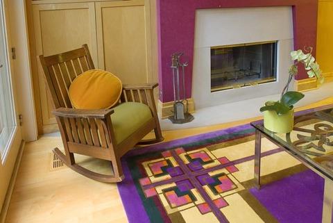 Modern Library with bright pink accent wall