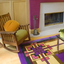 Modern Library with bright pink accent wall