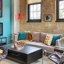 Eclectic Family Room with metal framed corbusier chair