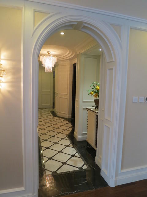 Traditional Entry with black and white marble floors