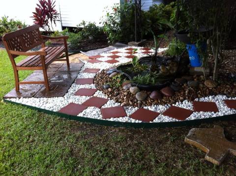 Eclectic Landscape with flagstone stamped concrete pads