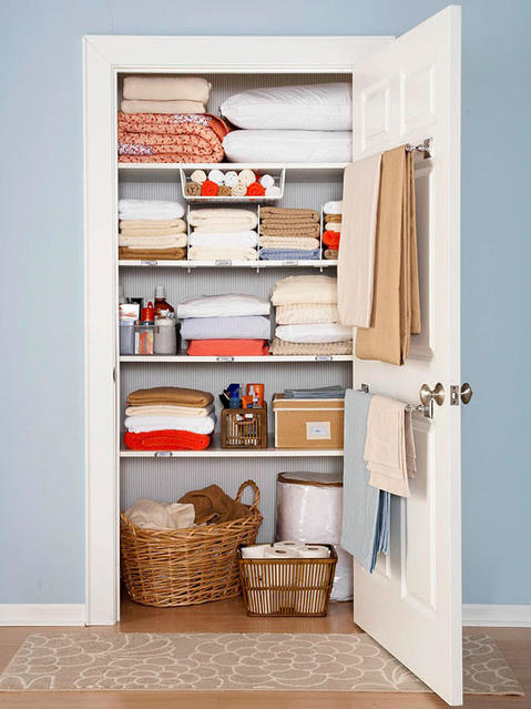 Transitional Closet with light blue painted walls