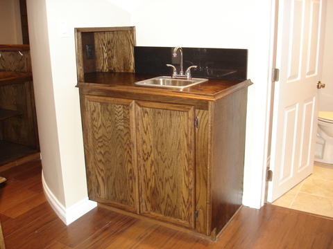 Transitional Dining Room with drop-in stainless steeel bar sink