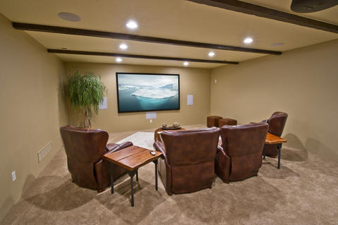 Eclectic Home Theater with neutral paint color