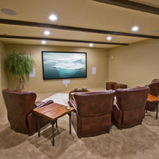 Eclectic Home Theater with neutral paint color