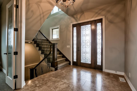 Traditional Entry with leaded glass entry doors and side viewing windows