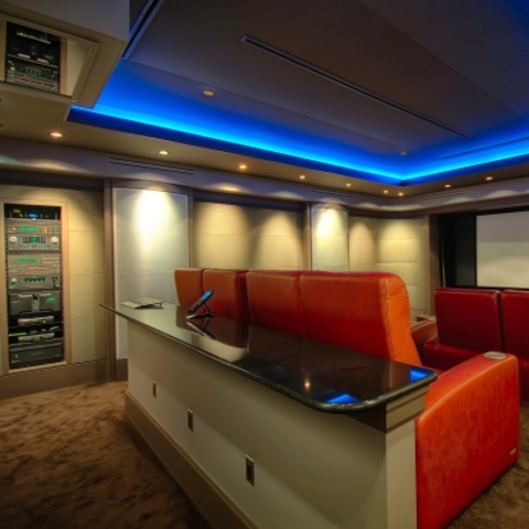 Modern Home Theater with red leather theater chair