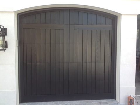 Transitional Garage with sectional garage door