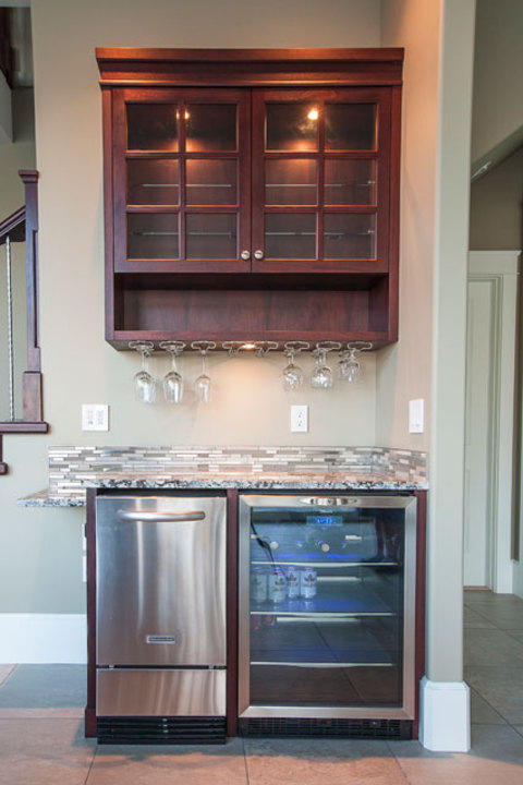 Transitional Basement with stainless steel dishwasher