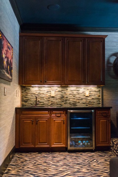 Eclectic Family Room with interlocking mosaic tile backsplash