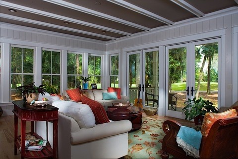 Transitional Sunroom with brown painted ceiling