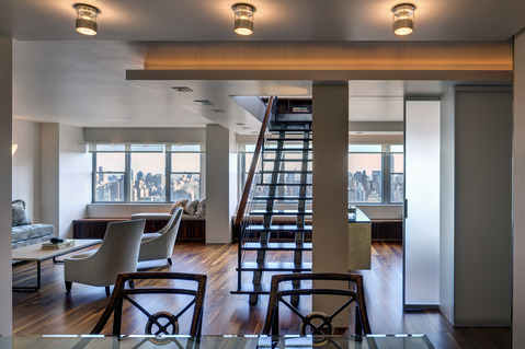 Modern Dining Room with floating staircase