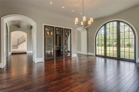 Transitional Dining Room with lamp shade chandelier