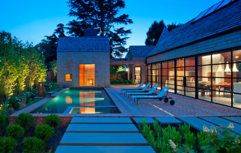 Eclectic Pool with floor to ceiling window