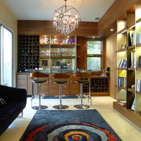 Eclectic Basement with black contemporary couch