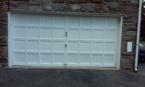 Transitional Garage with recessed panel garage door