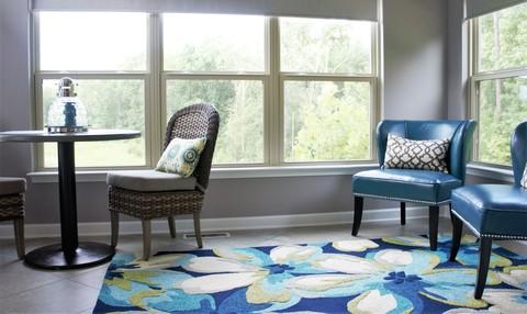 Transitional Sunroom with geometric accent pillow