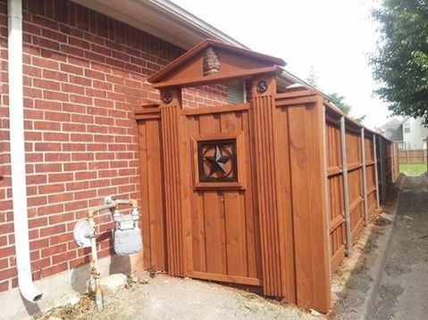Eclectic Landscape with wood privacy fence