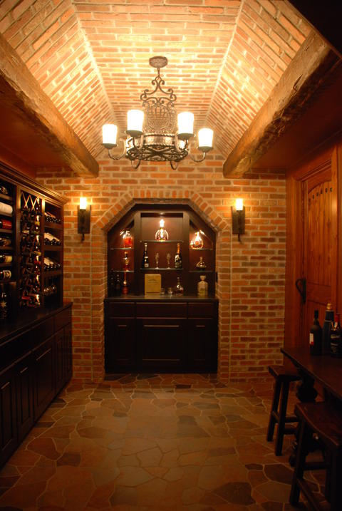 Traditional Basement with arched panel hardwood door