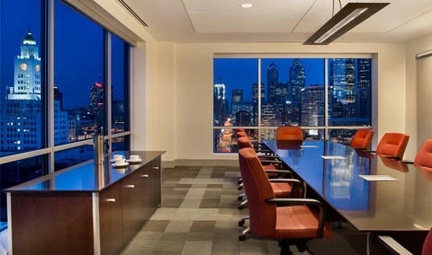 Contemporary Home Office with orange upholstered office chair