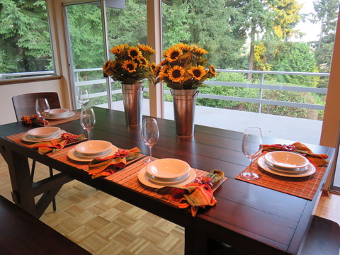 Eclectic Dining Room with split rail deck railing