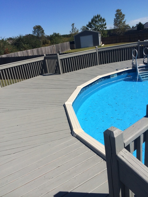 Transitional Pool with large above ground pool