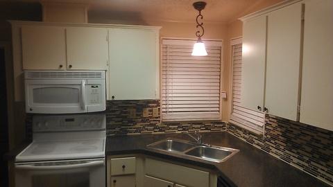 Traditional Home Theater with double bowl stainless steel sink