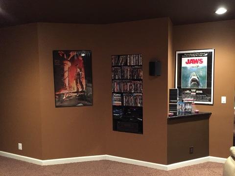 Traditional Home Theater with white floor moulding