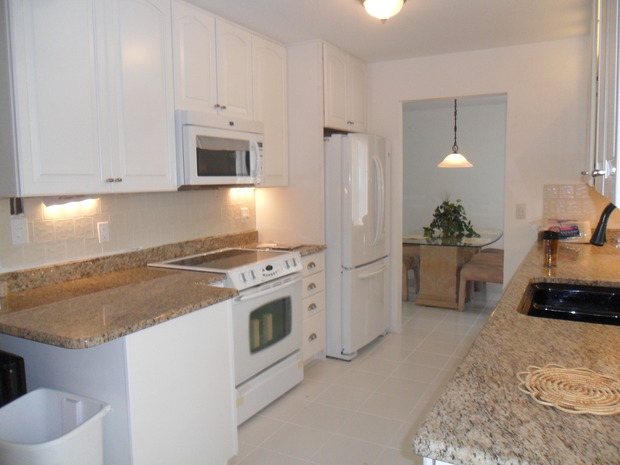 cottage galley kitchen design cottage kitchen in new port richey white appliances white walls by gladiator construction cottage galley kitchen design cottage kitchen in new port richey white appliances white walls by gladiator construction