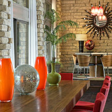 Modern Dining Room with dark wood floors