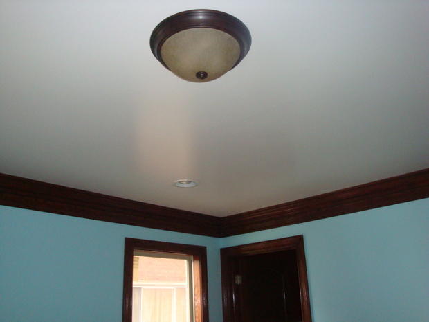 Transitional Dining Room In Detroit Darkly Stained Crown Molding