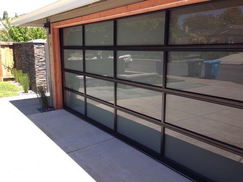 Modern Garage with aluminum and glass two car garage door