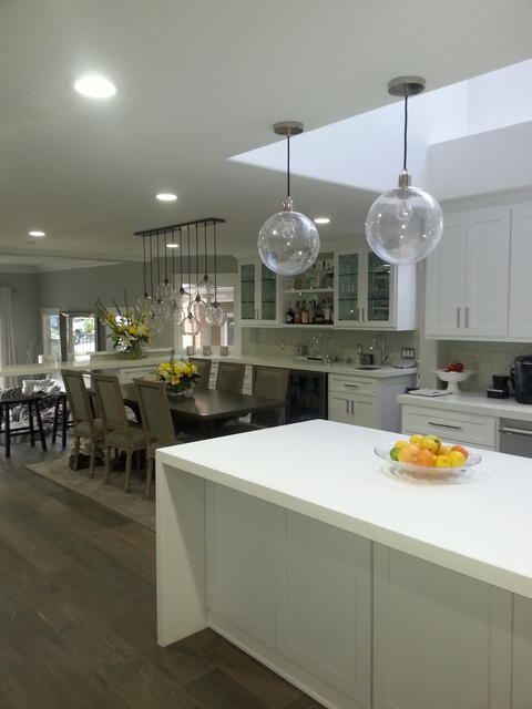 Modern Dining Room with wide planked hardwood floors