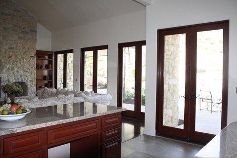 Transitional Dining Room with raised panel cabinet doors