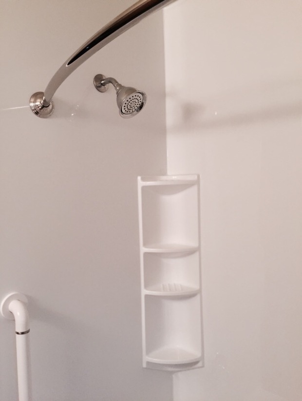 Transitional Bathroom in Algonquin bowed shower curtain rod, acrylic