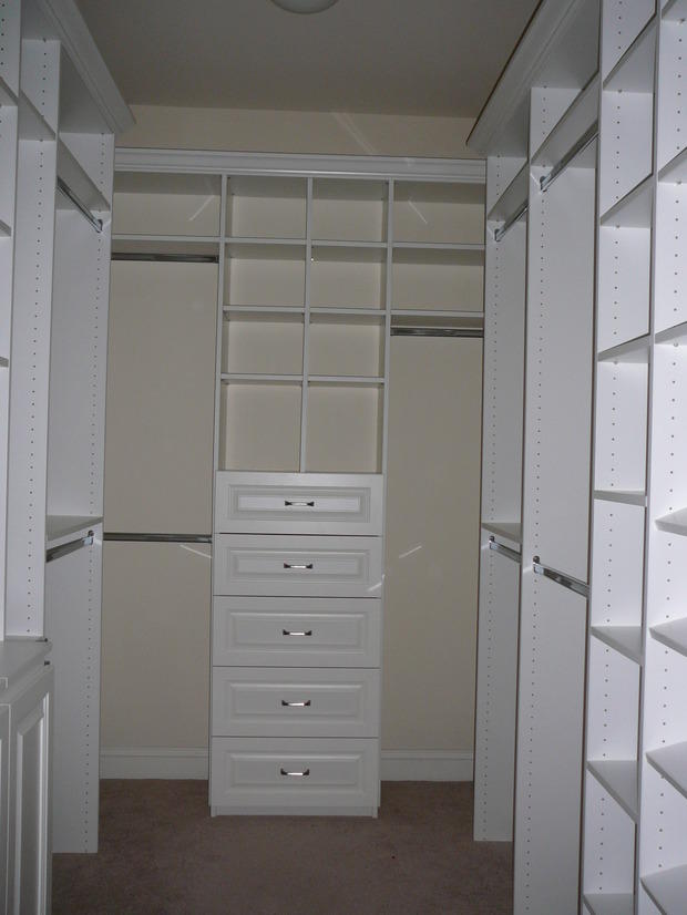 Transitional Closet in Silver Spring off white wall color, closet