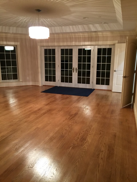 Transitional Dining Room with natural finish strip oak floor