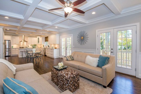 Traditional Family Room with ceiling fan with light