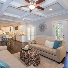 Traditional Family Room with ceiling fan with light