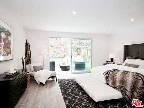 Transitional Bedroom with dark stained reclaimed wood headboard
