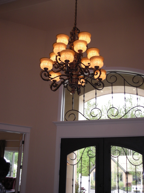 Tuscan Entry with scrolled metal ornamentation