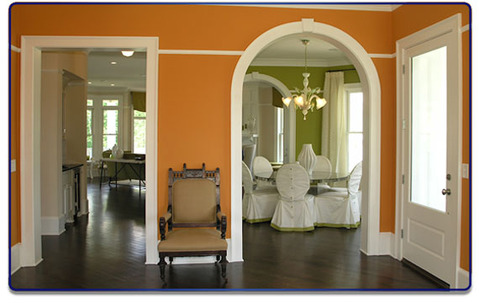 Eclectic Entry with slipcovered dining chairs